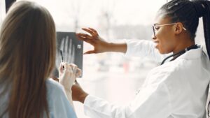 Two doctors review an X-ray.