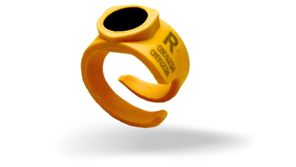 A yellow Ora OSL dosimeter ring by Radiation Detection Company.