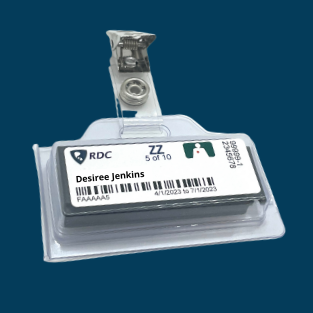 An OSL fetal monitoring badge on a dark blue background.