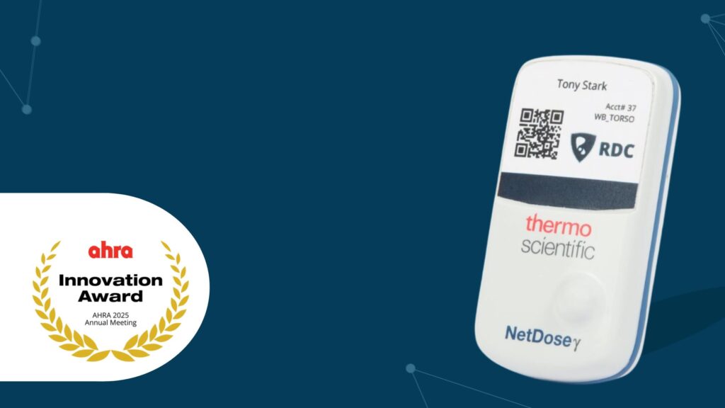 The red and gold AHRA Innovation Award logo is displayed on a dark blue background. On the right, NetDose™ digital dosimeter, a white electronic device stands out against a dark blue background.