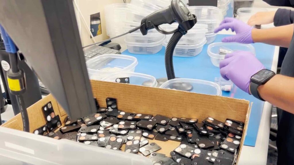 Production staff at RDC build TLD badges